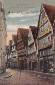 Historische Ansichtskarte aus Osnabrück mit kolorierter Straßenansicht der Bierstraße und ihren Fachwerkhäusern aus der Kaiserzeit – eine historische Postkarte als Zeugnis der Stadtgeschichte Osnabrücks aus der Vorkriegszeit.